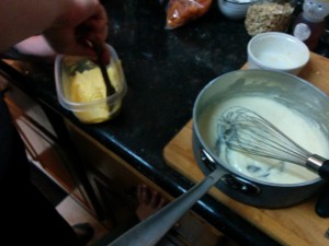 Liz, mashing the yolks and the sugar.